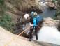Barranquismo en Córcega. Santi rapelando la última cascada del Piscia du Gallu (70m)